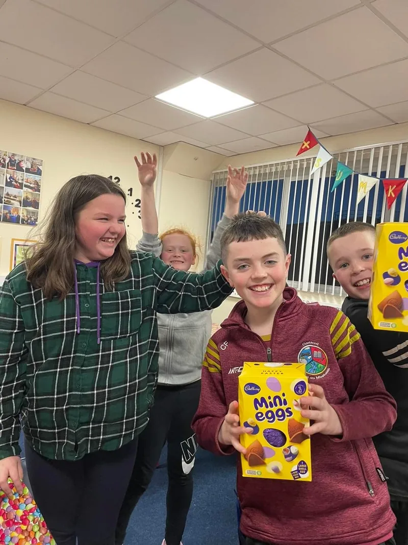 Pupils celebrating at the end of term with Easter eggs at Sumkids